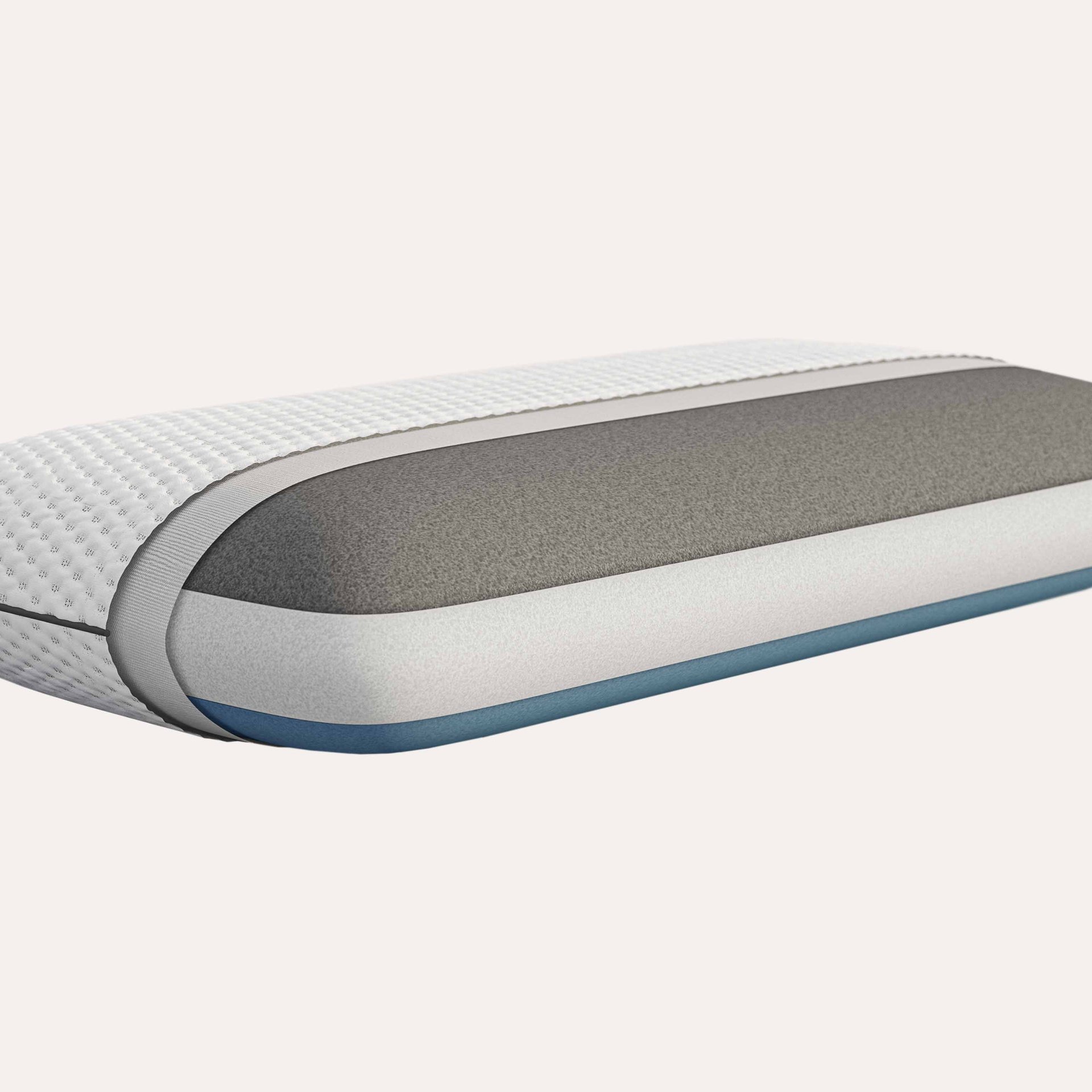 Cuscino a strati con rivestimento trapuntato bianco, sezione grigia, base blu e