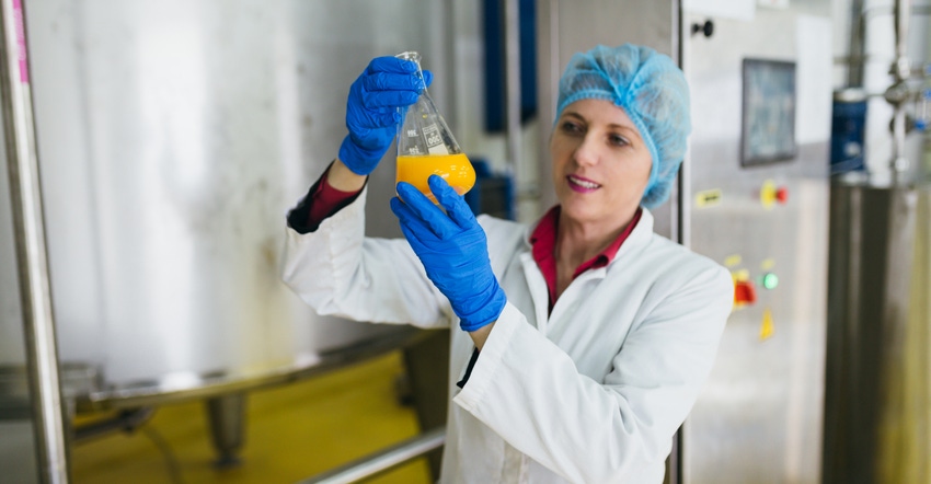 Woman with juice.jpg Woman with juice.jpg