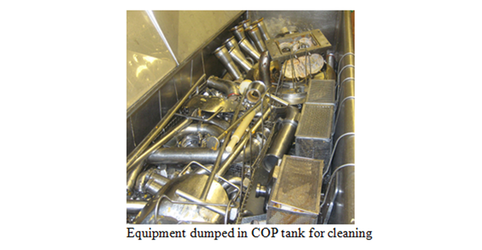 Equipment dumped in COP tank for cleaning.png