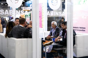 At SupplySide West in 2022, professionals meet in the Sabinsa booth.
