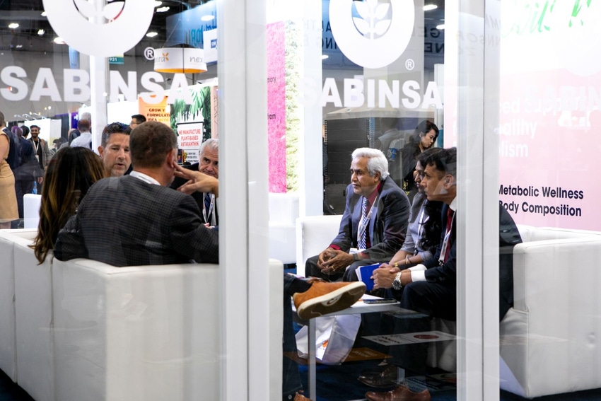At SupplySide West in 2022, professionals meet in the Sabinsa booth.