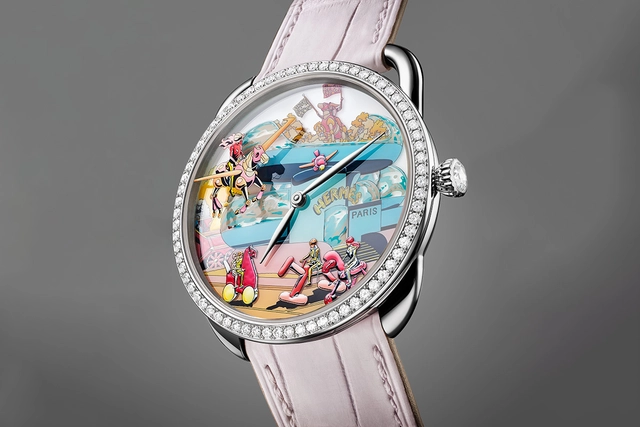 Hermès Arceau Locomotion, Uhr mit Weißgoldgehäuse und buntem Zifferblatt Hermès Arceau Locomotion, Uhr mit Weißgoldgehäuse und buntem Zifferblatt