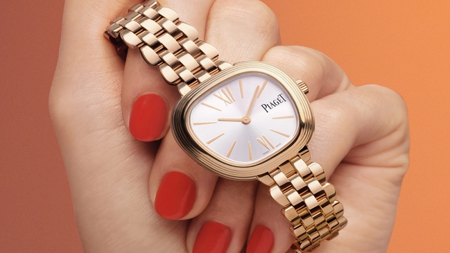 Piaget Sixtie, Golduhr, Damenuhr in der Hand