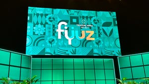 The FYUZ sign on screen and on stage in Madrid in 2023.