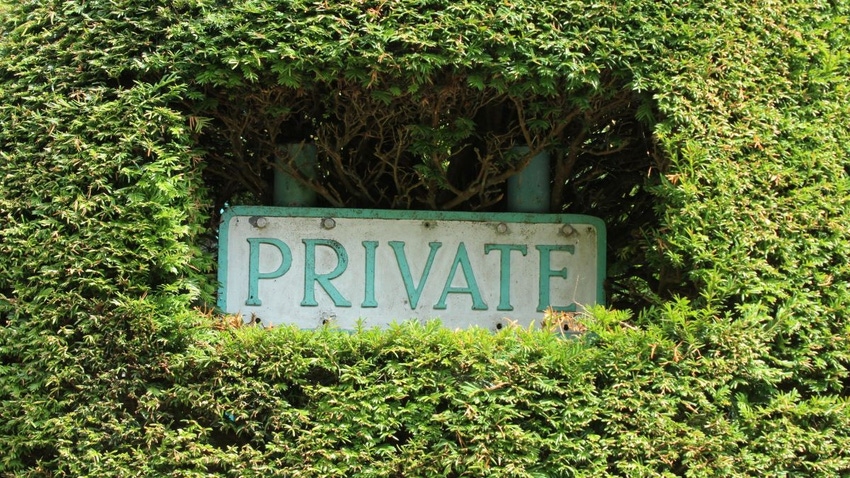 'Private' sign in hedge