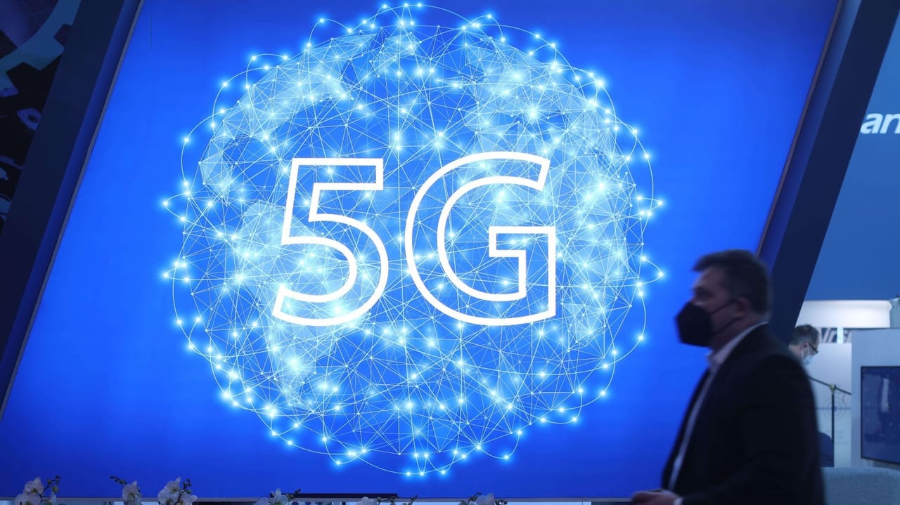 A visitor walks past the a 5G logo at the Mobile World Congress (MWC), the annual trade show organised by GSMA at the Fira de Barcelona, Spain. A visitor walks past the a 5G logo at the Mobile World Congress (MWC), the annual trade show organised by GSMA at the Fira de Barcelona, Spain.