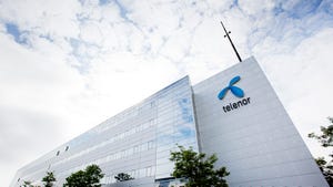 Telenor's office building in Denmark with its logo.