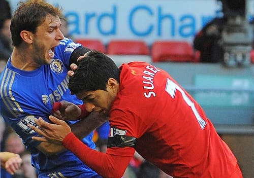 Luis Suarez bites Branislav Ivanović during a Liverpool-Chelsea clash.