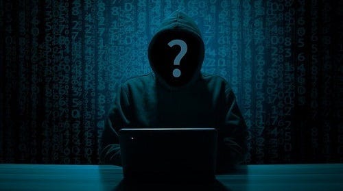 Beware the faceless hoody-wearing hacker with a penchant for binary code wallpaper. (Image by B_A from Pixabay)