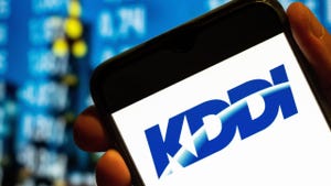 KDDI logo is displayed on a smartphone screen