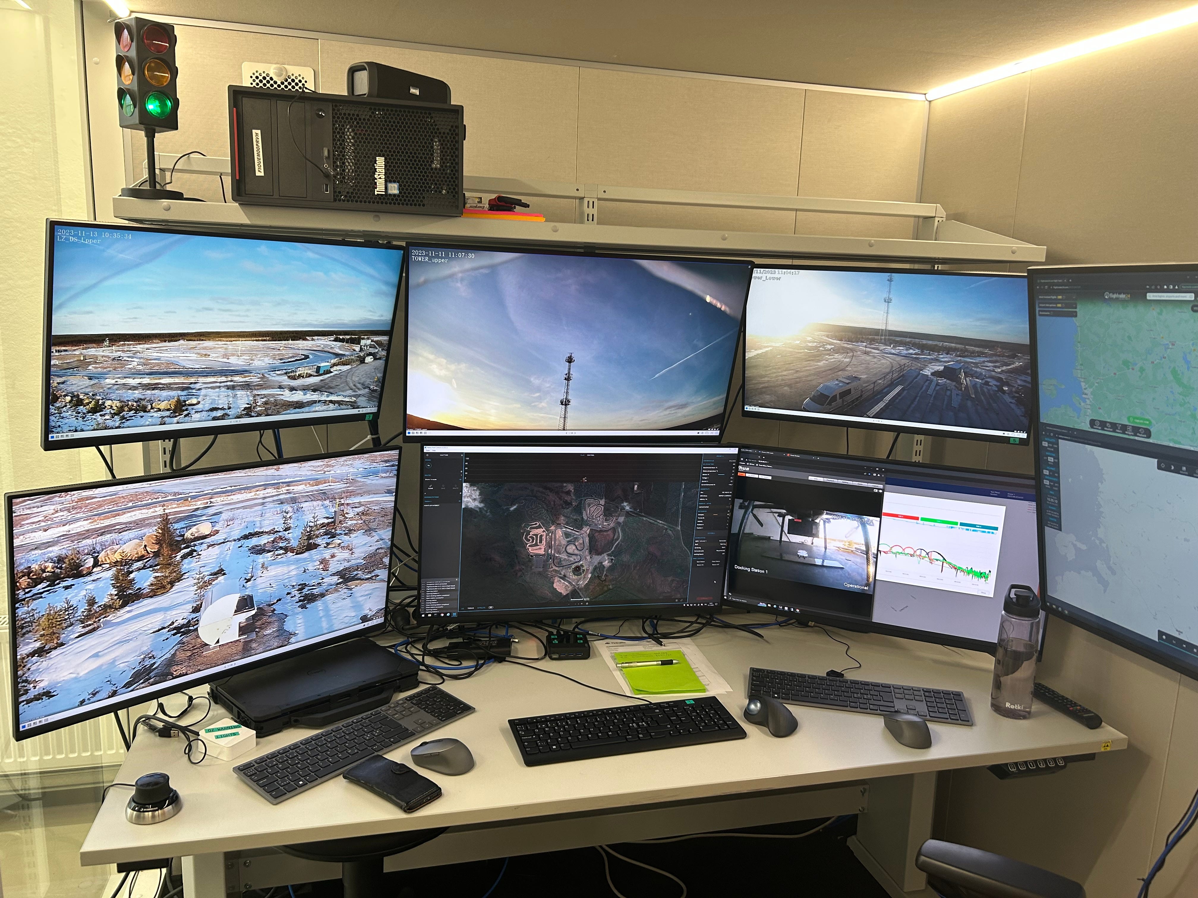 Screens showing drones and data they generate Screens showing drones and data they generate