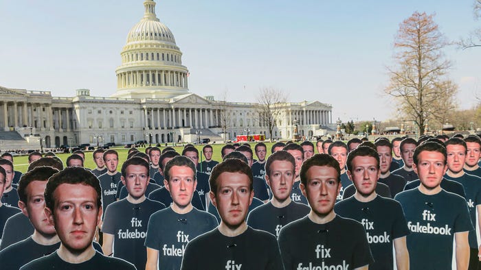 You've been zucked: Cutouts of Mark Zuckerberg protest in Washington DC ahead of his appearance before the US Senate. (Source: Joe Flood on Flickr CC2.0)