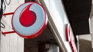 Vodafone logo on a shop front.