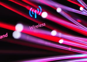 Red light fiber optics shooting past a broadband hub illustrating digital communications