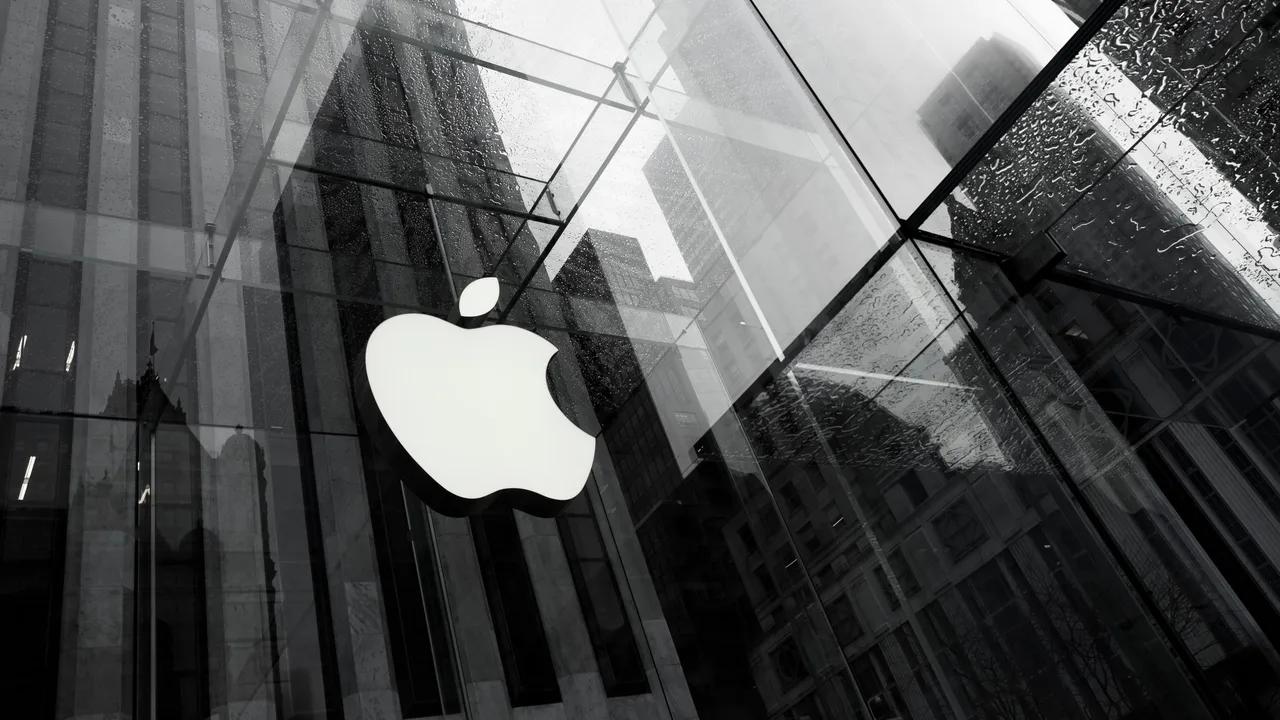 Apple logo at the underground Apple store on Fifth Avenue, near Central Park, New York, US Apple logo at the underground Apple store on Fifth Avenue, near Central Park, New York, US
