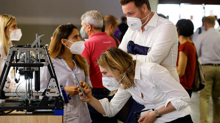 Hot ticket: Despite the need to wear masks - and the sizzling summer temperatures - the hardy braved the steamy interior of the Fira. (Source: MWC Barcelona)