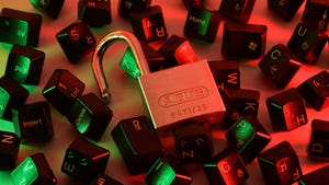 Keyboard keys scattered on a green-and-red background with an open silver padlock in the middle.