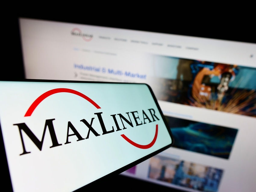 MaxLinear logo on a smartphone screen in front of website