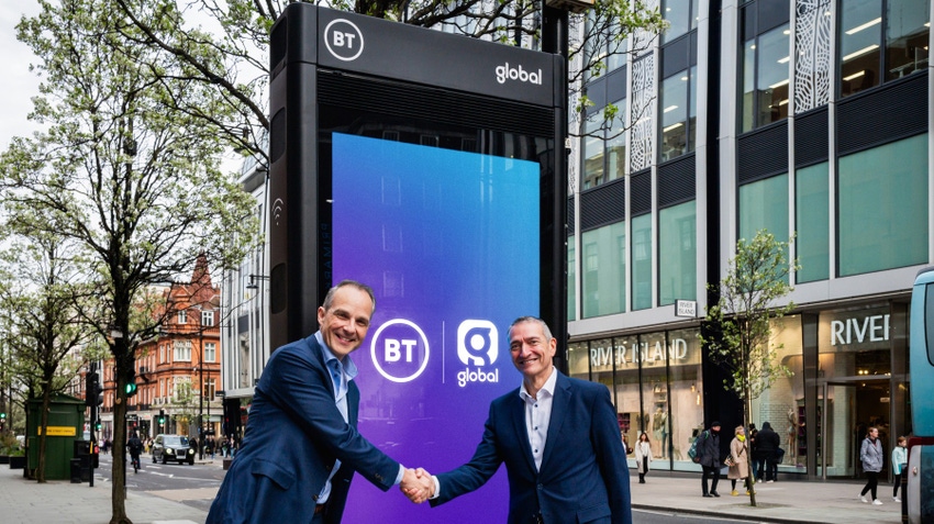 Bas Burger (left), CEO of BT Business, shakes on smart hubs deal with Global's Stephen Miron.