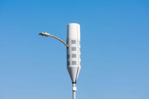 A typical small cell antenna for 5G wireless network installed on lamp post