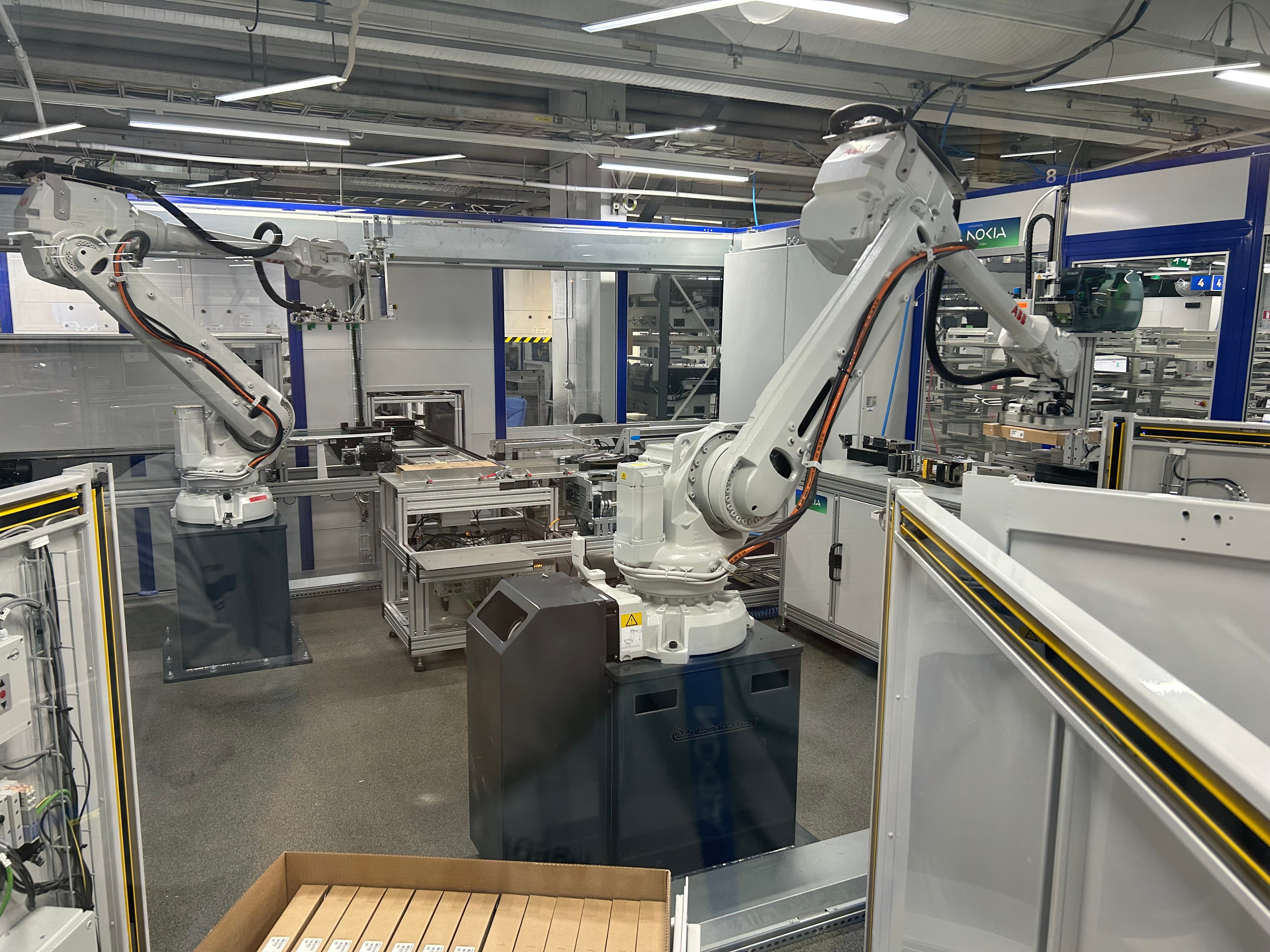 Robot arms inside Nokia's Oulu factory