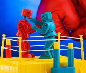 ock em Sock em Robots classic game by Mattel with boxing gloves in background