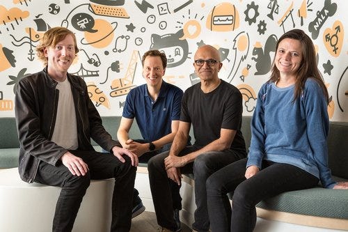 Github CEO and co-founder Chris Wanstrath (left); Nat Friedman, Microsoft corporate vice president, developer services and incoming GitHub CEO; Microsoft CEO Satya Nadella; and Microsoft CFO Amy Hood. Photo by Microsoft.
