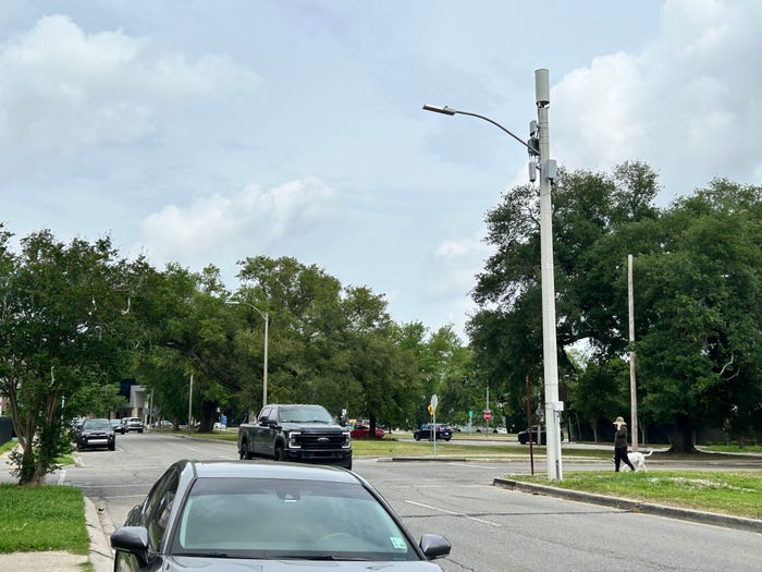 (Source: Kelsey Ziser, Light Reading) (Right) Verizon small cell on a light tower in New Orleans. 