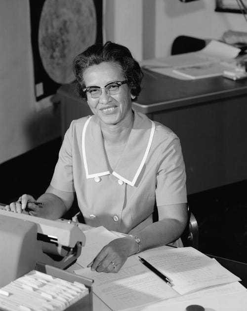 People like Katherine Johnson, a NASA employee shown here in 1966, worked as 'computers' for centuries. Johnson later worked as a physicist and mathematician. She's a character in the 2016 movie Hidden Figures.