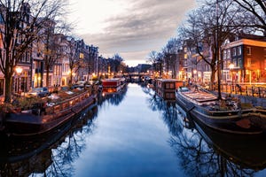 Dutch canals in Amsterdam during winter.