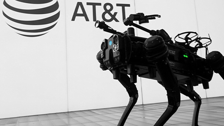 Robot dog in front of AT&T sign