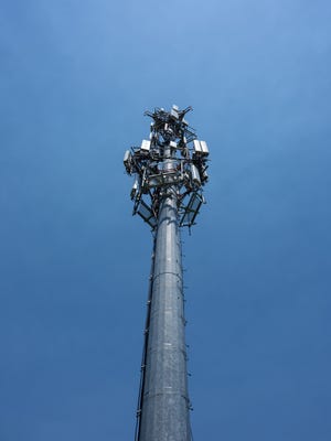  cell phone tower against blue sky
