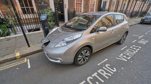 Nissan Leaf being charged on the street