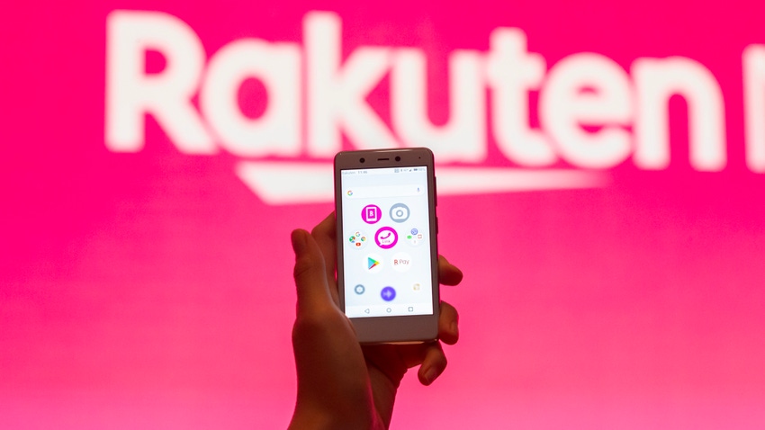 Smartphone in front of Rakuten logo