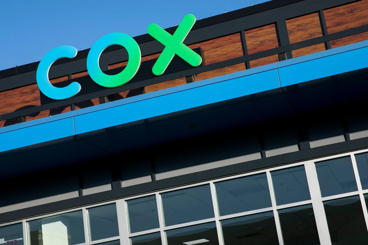 Cox Communications logo sign on building Cox Communications logo sign on building