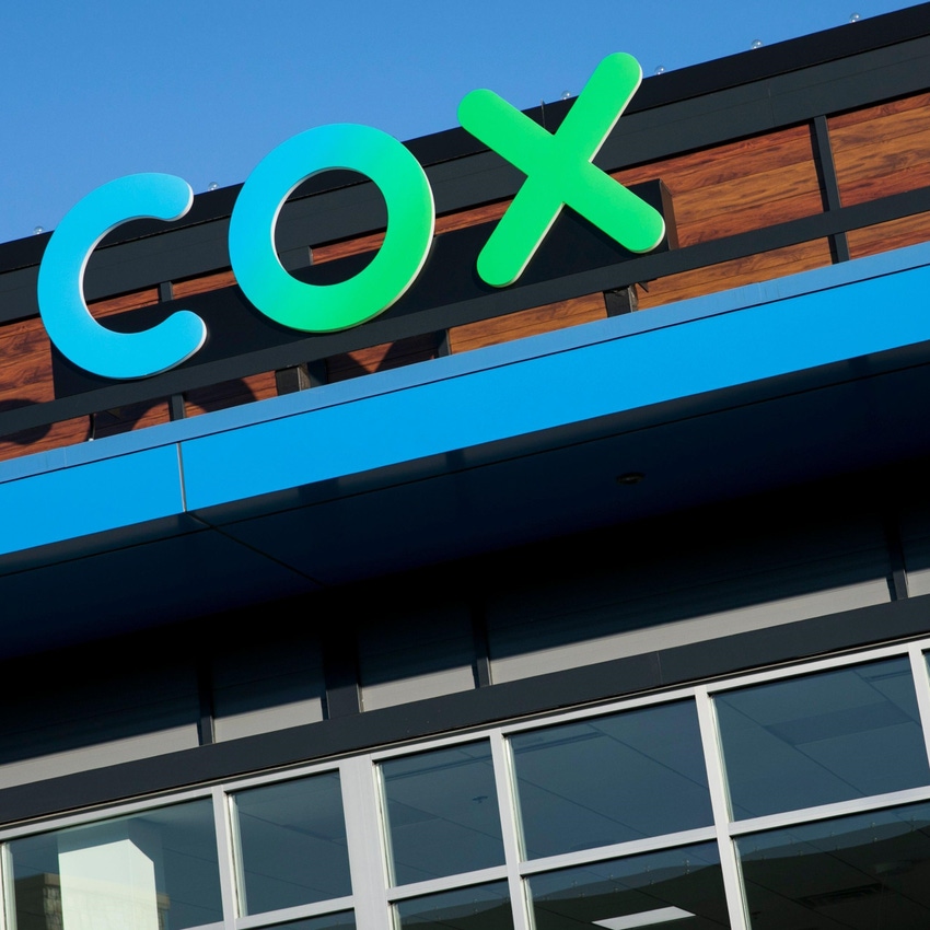Cox cuts 'very small percentage' of workforce