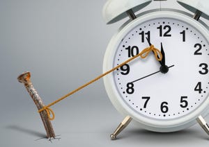 Time on clock stopped by a nail attached with string