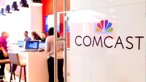 Comcast logo at a workspace Comcast logo at a workspace
