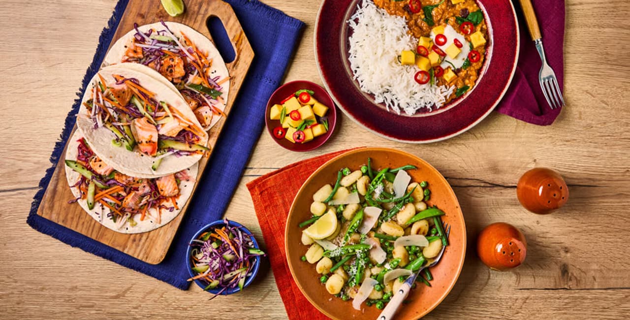 An assortment of Gousto's easy mid week meals including tacos, salad and curry