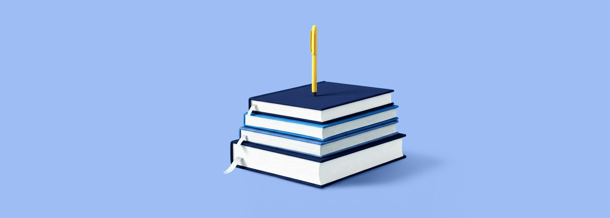 A stack of four blue books with white pages stands against a light blue background. A yellow pen stands vertically on the top book.