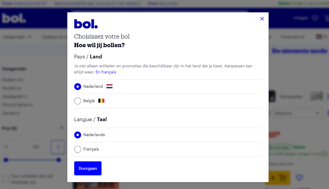 Pop-upvenster van Bol.com waarin de gebruiker het land en de taal kan kiezen, met opties voor Nederland of België en Nederlands of Frans.