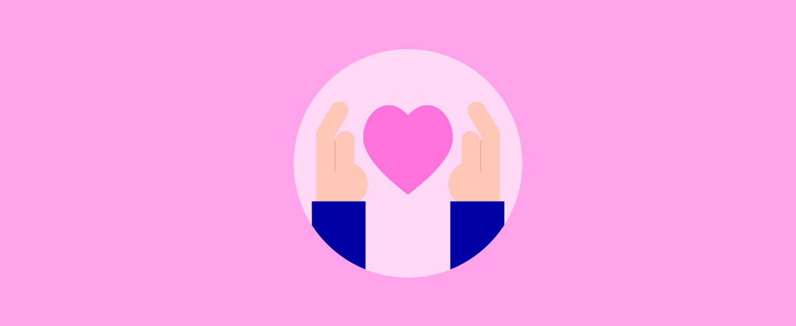 Hands holding a heart.