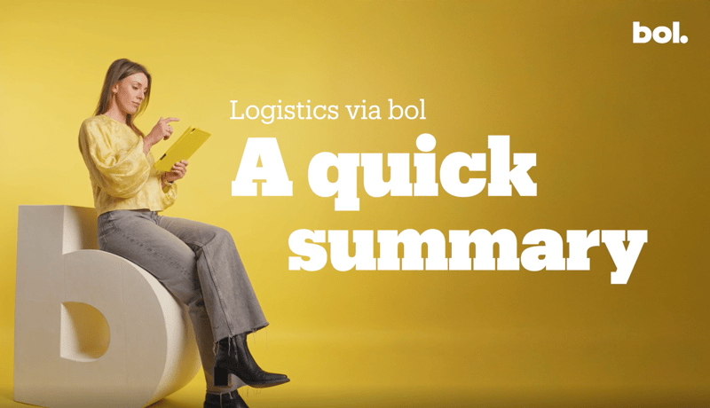 Charlotte ter Laak, presenter of this video, is sitting on a large 'b'.