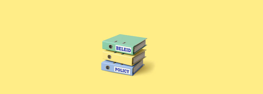 A stack of books representing bol's policy
