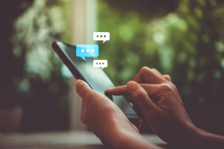 Photo of somebody text messaging Photo of somebody text messaging