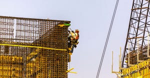 Two workers on the construction of a building for Samsung corporation on First St. in San Jose, California.