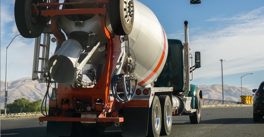 Mixer truck transporting cement to the construction site, south San Francisco Bay Area, California.