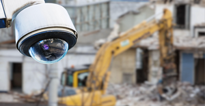 CCTV camera looks watch on a construction site.
