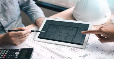 Construction blueprints shown on a tablet screen
