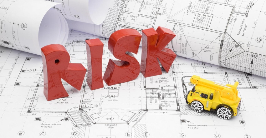 Image showing blueprints and risk for a construction project.